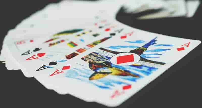 playing cards on black surface