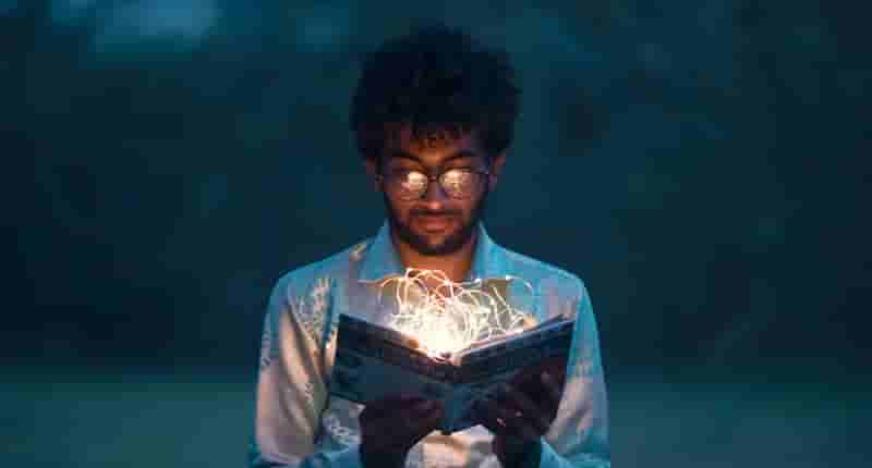 man holding book