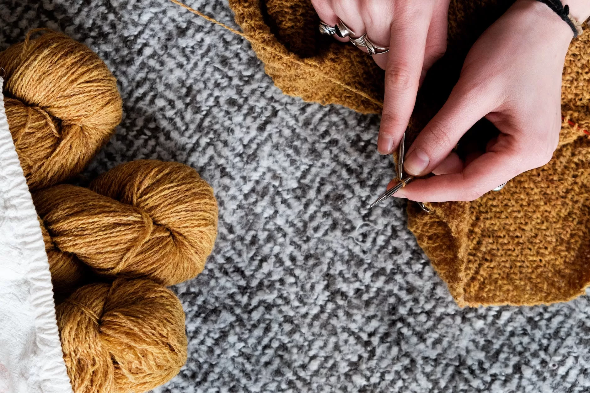 photo of person holding wool
