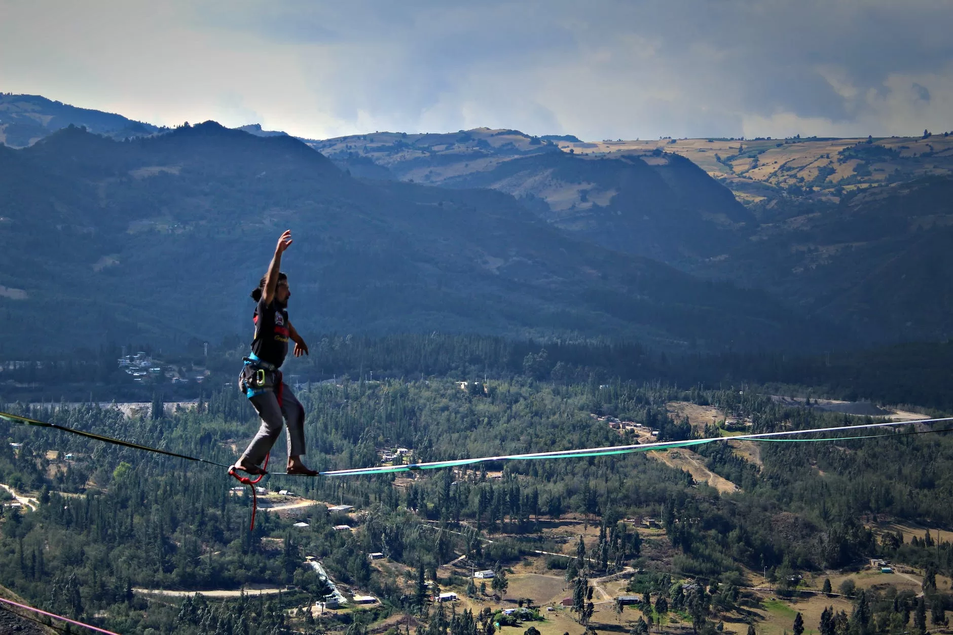 a man walking on the rope