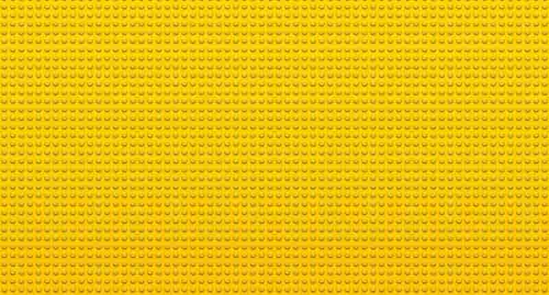 a yellow background with small dots