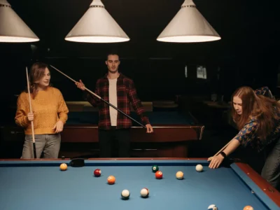 people playing billiards